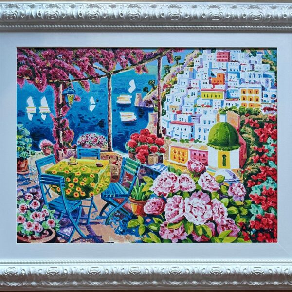 Opera incorniciata: Le sedie azzurre nella luce di Positano  | Athos Faccincani